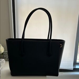 CHIC, SPACIOUS TOTE THAT TAKES YOU FROM WORK TO WORKOUT